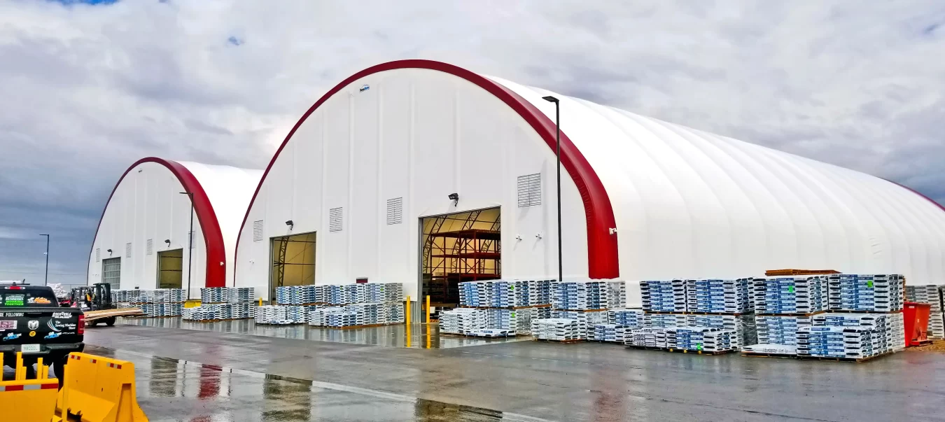 RoofMart open house event with large white fabric dome structure and equipment display